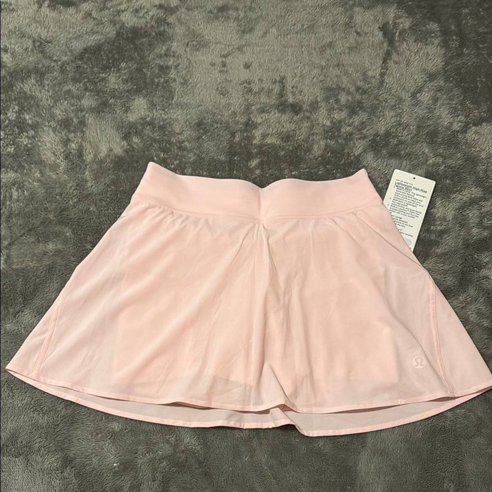 Lululemon high rise tennis Skirt strawberry milkshake color size 6.